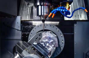 CNC machining center milling a precision metal component for manufacturing